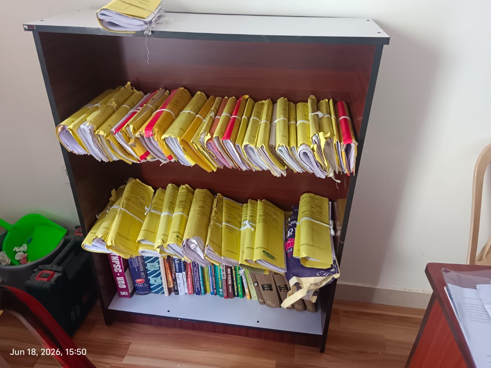 Shelves of case files and law books in the chambers